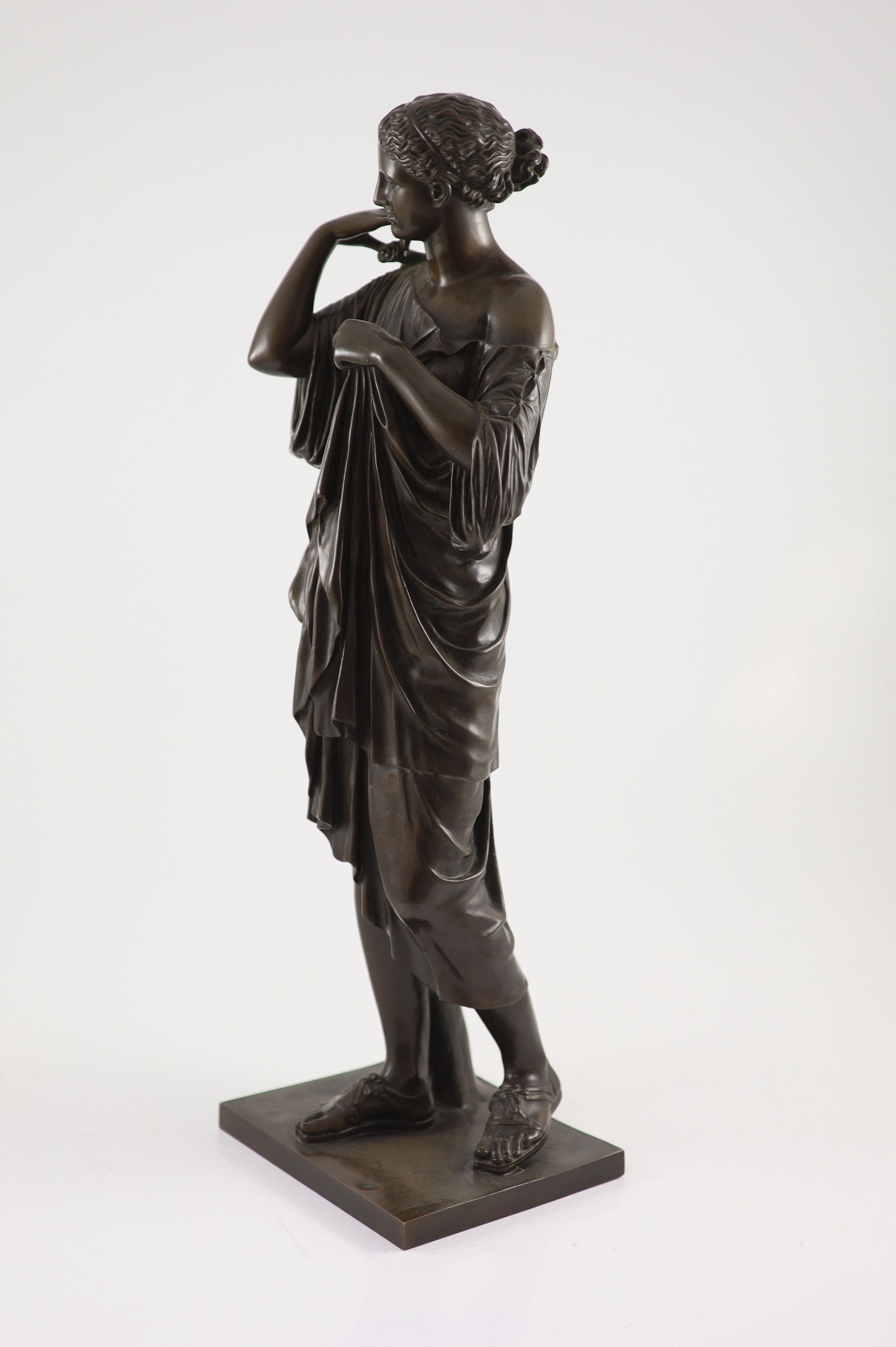 A large 19th century bronze figure of a classical maiden H 55cm. W 17cm.
